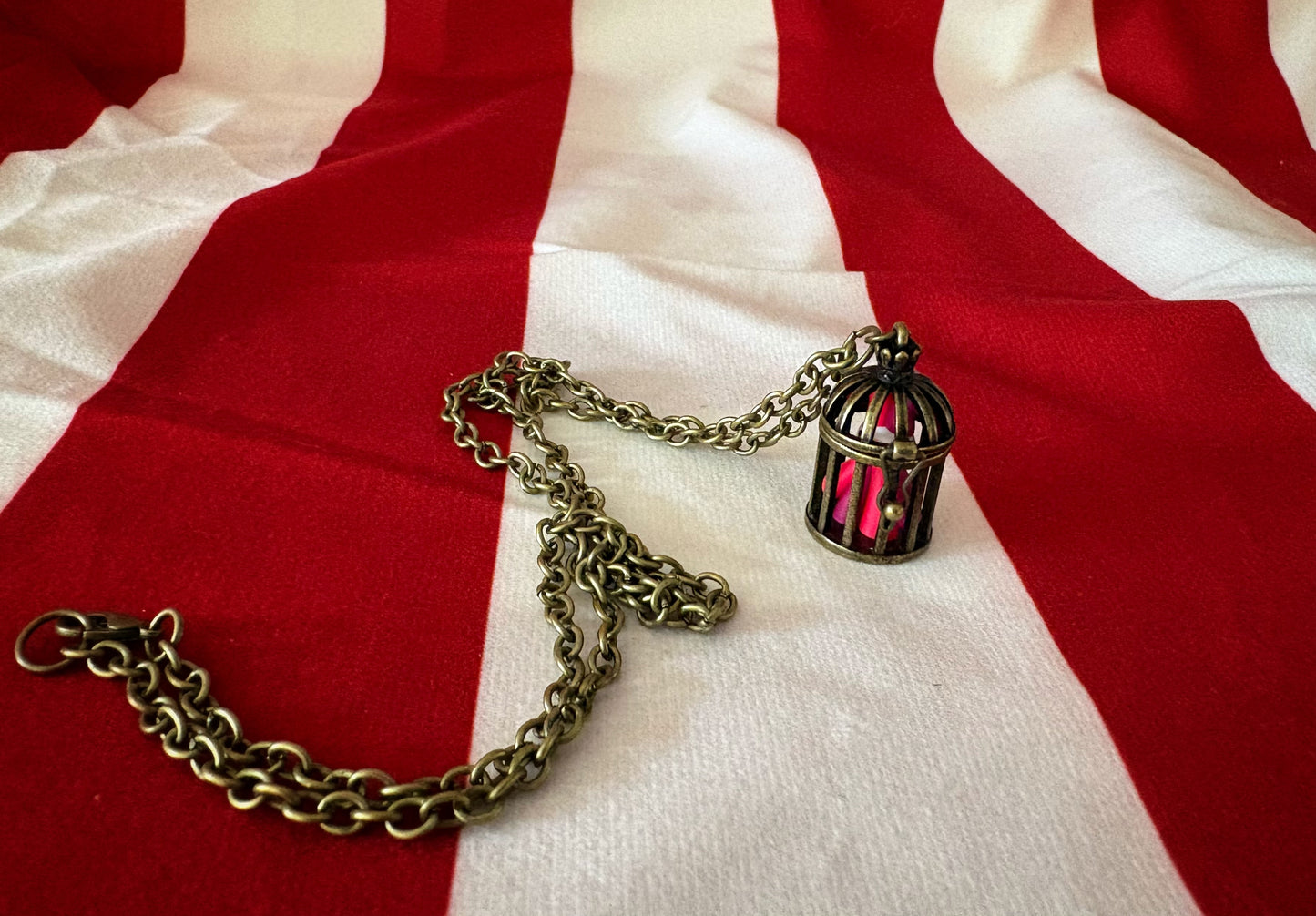 Tiny Caged Clown Necklace